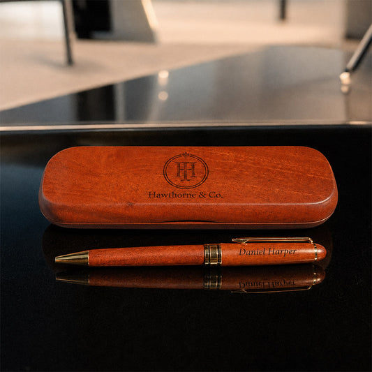 Personalized rosewood pen and matching box with engraved company logo and Daniel Harper name -- lxi-context:corporate