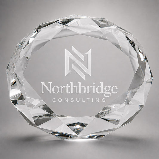 Personalized faceted crystal paperweight with engraved Northbridge Consulting logo and company name -- lxi-context:corporate