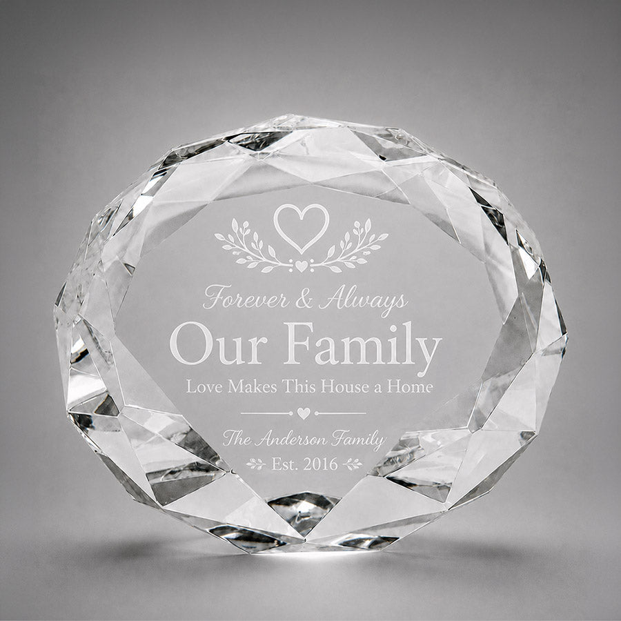 Personalized faceted crystal paperweight with engraved Our Family message, family name, heart accents, and established date -- lxi-context:house-warming