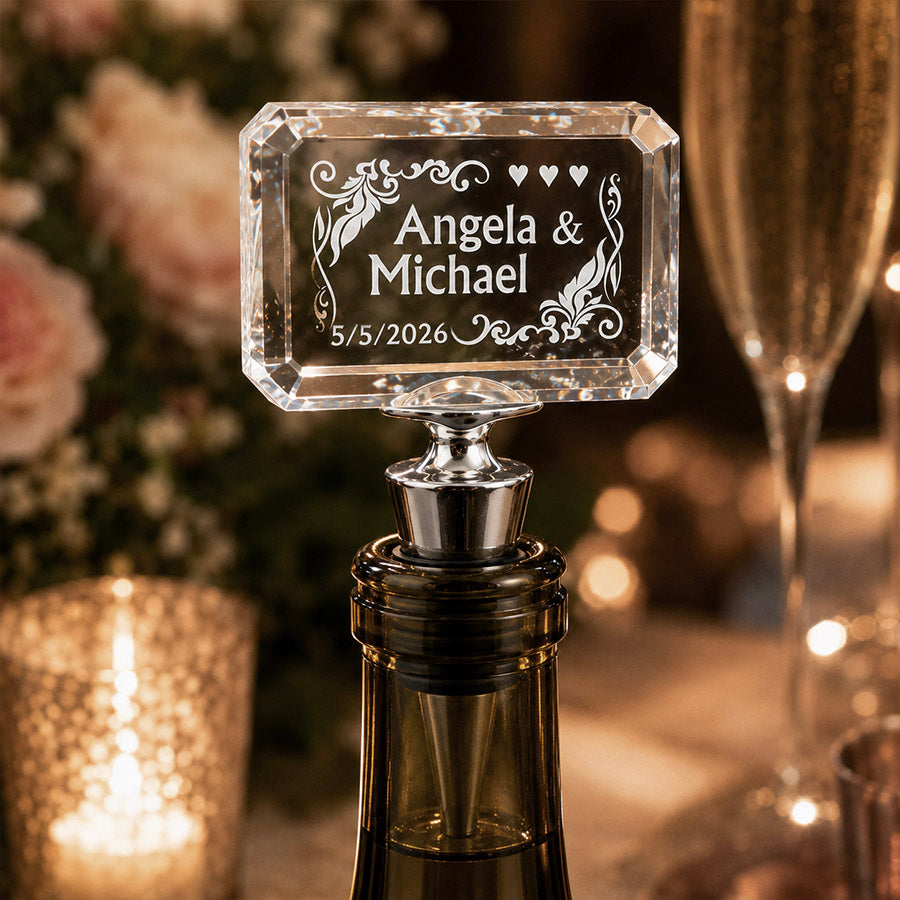 Personalized crystal wine stopper engraved with Angela and Michael names, wedding date, hearts, and floral accents -- lxi-context:wedding -- lxi-context:engagement