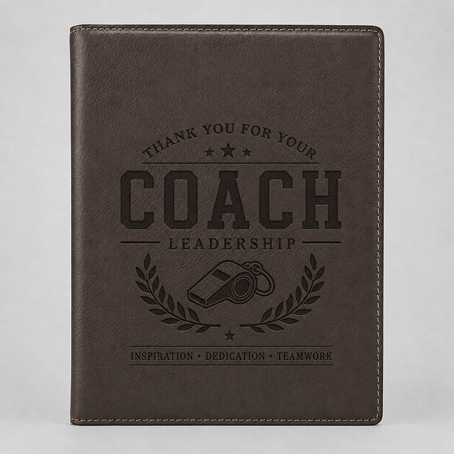 Personalized brown leatherette portfolio with engraved Coach Leadership design, whistle graphic, laurel accents, and teamwork message -- lxi-context:for-coach