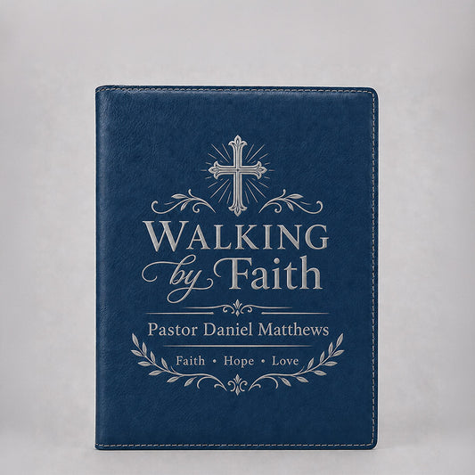 Personalized blue leatherette portfolio with silver Walking by Faith design, cross accent, pastor name, and faith message -- lxi-context:faith