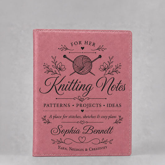 Personalized pink leatherette portfolio with black Knitting Notes design, yarn and needle graphic, floral accents, and custom name -- lxi-context:for-her