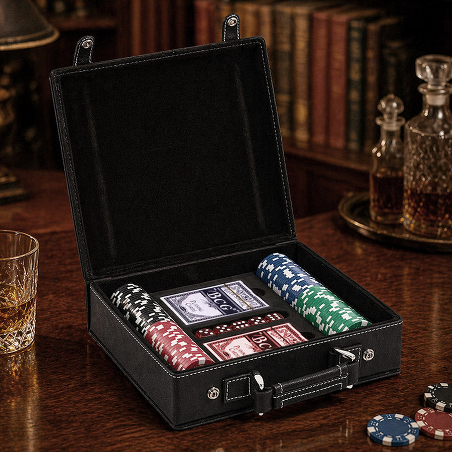 Open poker set case with cards, dice, and poker chips displayed inside a black leatherette case