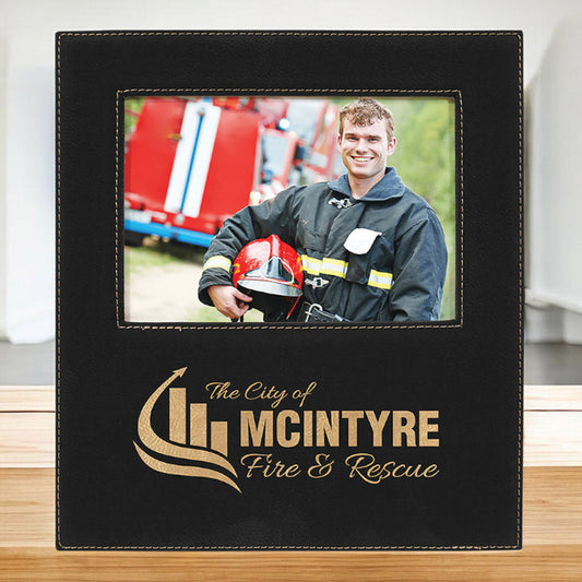 Personalized 5x7 black leatherette picture frame with firefighter photo and engraved McIntyre Fire & Rescue logo -- lxi-context:gratitude lxi-context:corporate