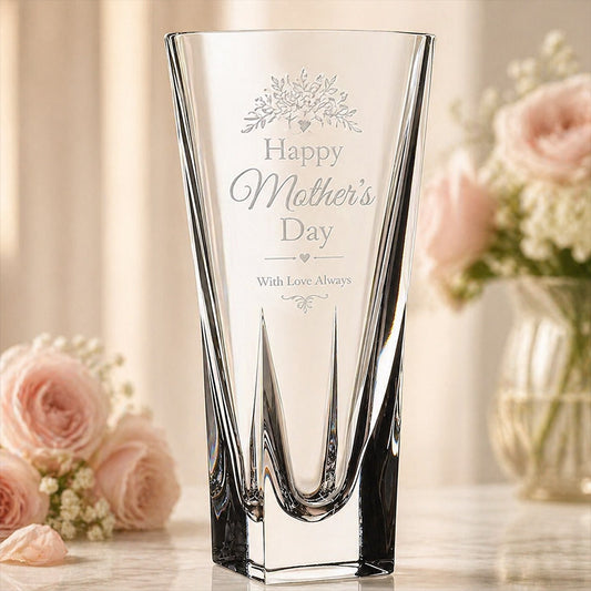 Engraved crystal vase with Happy Mother’s Day message, floral accents, and soft pink rose display background -- lxi-context:mothers-day