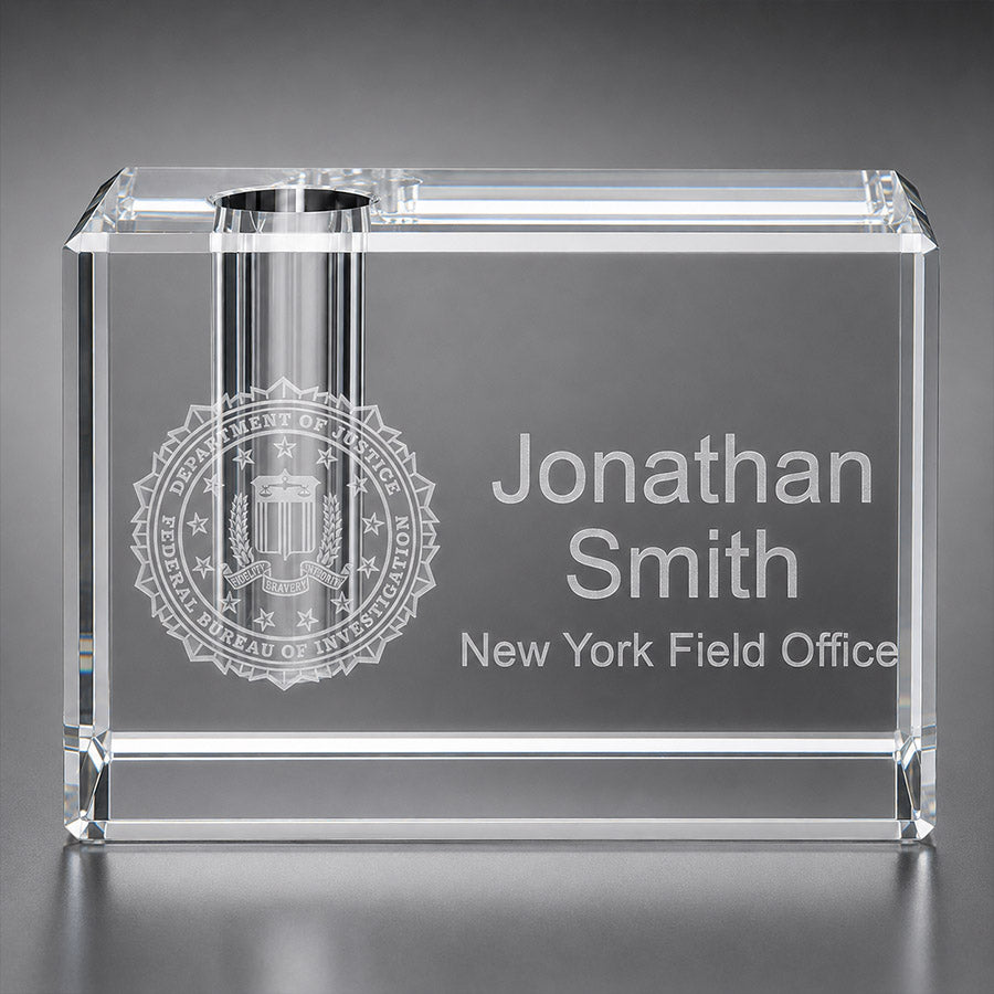 Personalized crystal pen holder with engraved agency seal, Jonathan Smith name, and New York Field Office text -- lxi-context:corporate