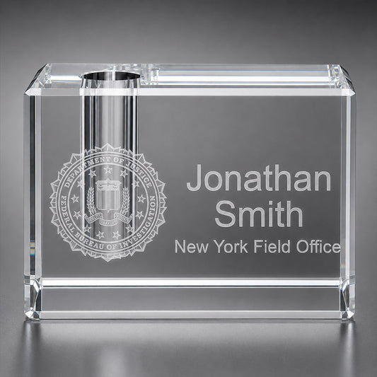 Personalized crystal pen holder with engraved agency seal, Jonathan Smith name, and New York Field Office text -- lxi-context:corporate